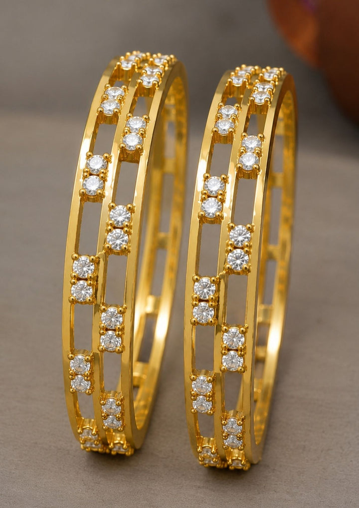 Beautiful zircon diamond gold plated bangle pair featuring dazzling CZ stones, an elegant openwork pattern, and premium craftsmanship. Perfect for daily wear, parties, weddings, festive occasions, traditional outfits, and premium gifting.