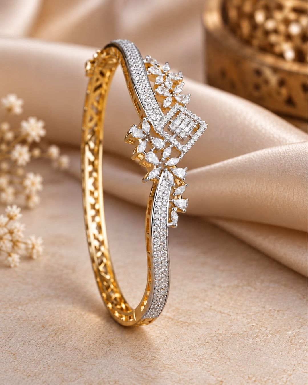 Gold plated openable bracelet featuring a dual-tone gold and silver finish with sparkling white CZ stones and intricate floral embellishments.
