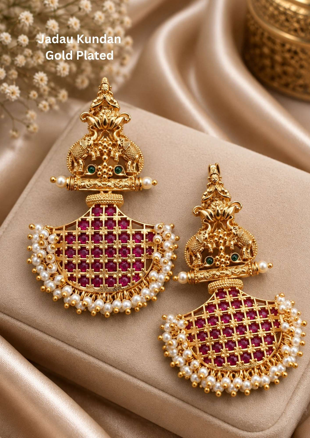 Gold plated hanging earrings featuring a structured top section beautifully embedded with clear, shimmering white Kundan stones. The center highlights vibrant red or green kemp stones structured in a classic floral or crescent frame, while the lower section finishes with an elegant, swinging bunch of real smooth gemstone beads, providing a colorful heritage look perfect for weddings and festivals.