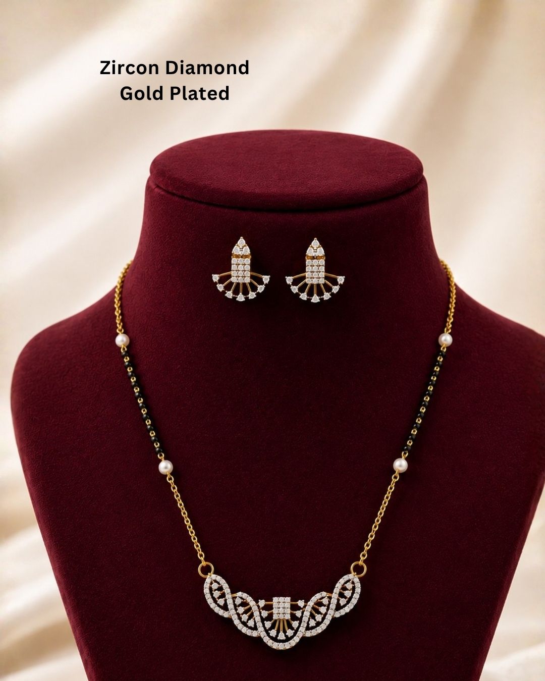 Beautiful black beads gold plated necklace set featuring an elegant curved pendant with intricate loops and sparkling stones, paired with matching diamond-finish earrings. Perfect for daily wear, festive occasions, parties, and gifting.