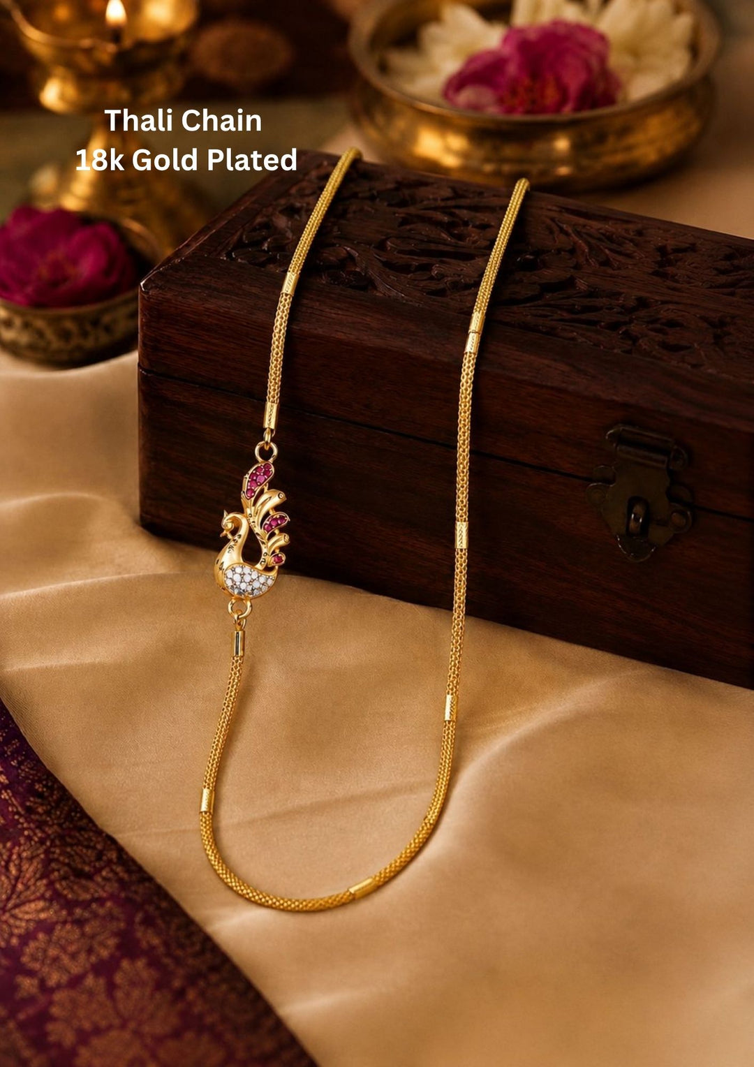 gold plated thali chain featuring an artistically sculpted elegant peacock mogappu side pendant embellished with glowing ruby red stones and a white zircon diamond-studded body. This traditional woven structure chain provides a high-end gold finish appearance suitable for weddings, festive occasions, poojas, family functions, traditional sarees, and ethnic wear with skin-friendly quality, comfortable everyday lightweight fitting, anti-fade long-lasting polish, and Cash on Delivery available now.