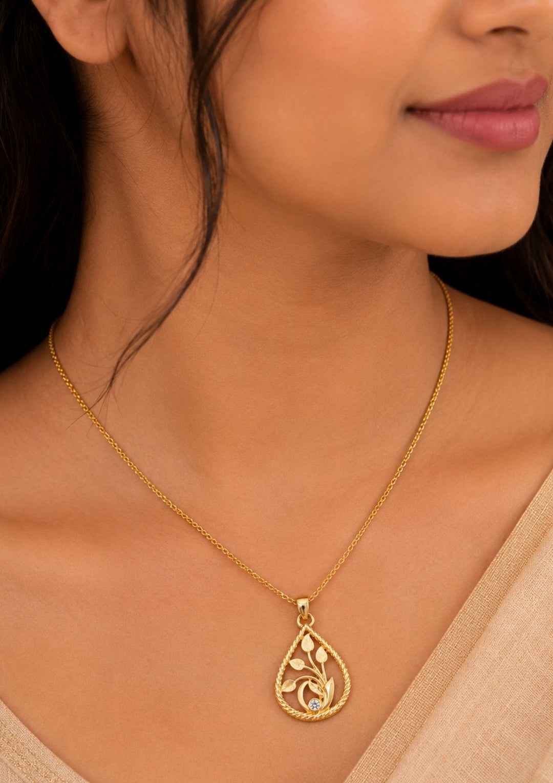 Elegant Zircon Diamond Gold Plated necklace set featuring sparkling zircon stones, a floral pendant with pearl drops, and matching earrings. Lightweight premium jewellery perfect for weddings, festive occasions, parties, traditional wear, and gifting.