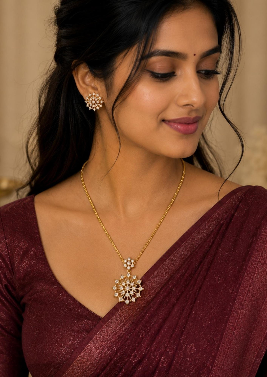 South Indian women wearing a Elegant Zircon Diamond gold plated pendant set featuring sparkling floral pendant with matching stud earrings. Perfect for office wear, parties, and festive occasions.
