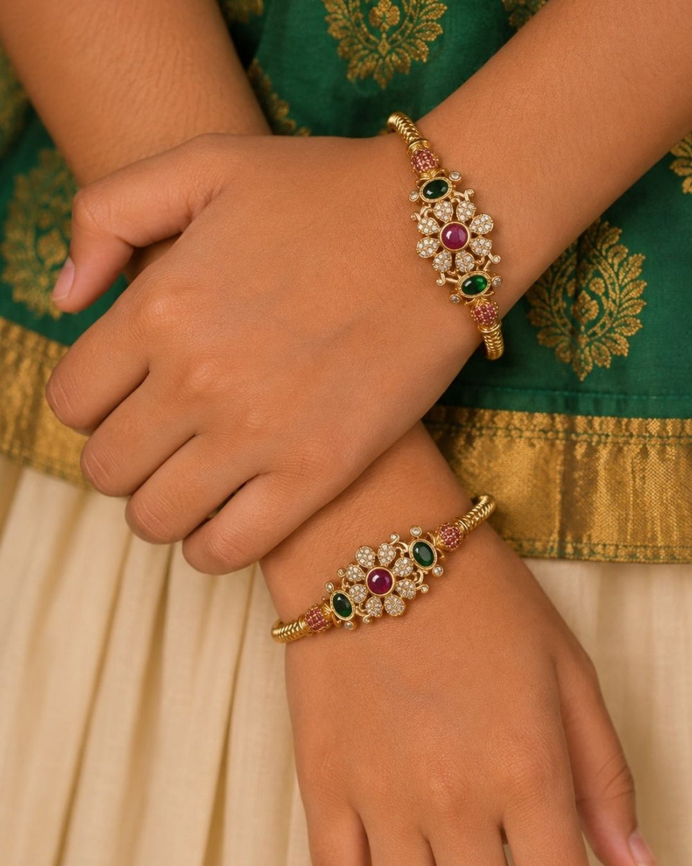 Jadau Kundan Gold Plated Flower Bangles designed with floral kundan stone work,  with kempu stones and traditional handcrafted bangle design, premium gold plated finish, lightweight structure, sweat proof coating, anti-fade colour protection, and skin-friendly wear suitable for weddings, festivals, pooja functions, bridal wear, and cultural celebrations.