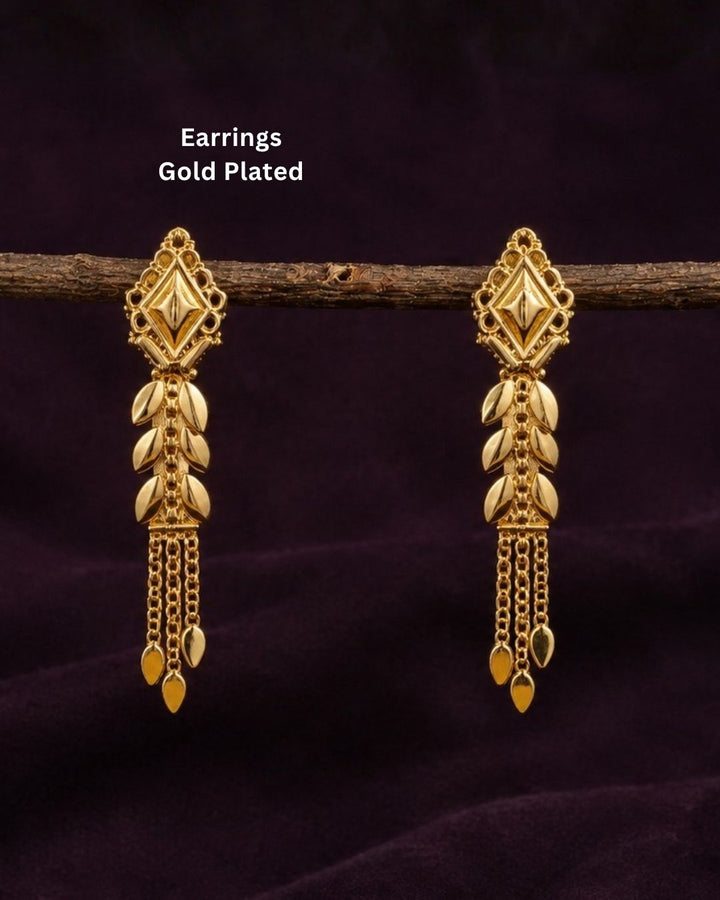Shop Traditional Gold Plated Leaf Drop Earrings featuring intricate geometric detailing, elegant leaf motifs, and cascading chain accents. Perfect for festive occasions, sarees, weddings, and traditional wear. COD available at Zevana.