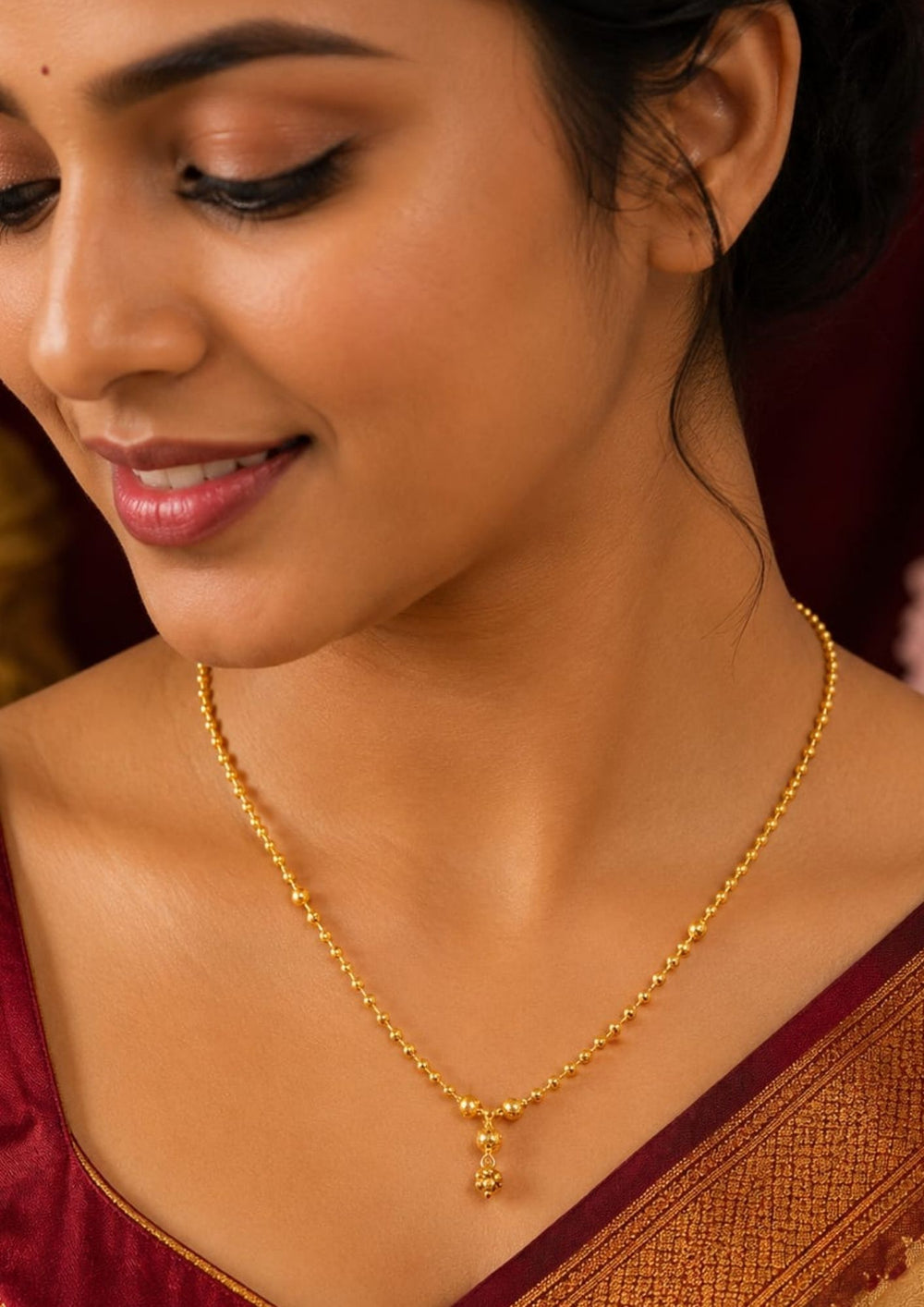 South indian women's Minimalist gold plated necklace showcasing intricate textured bead detailing with a graceful drop pendant, perfect for daily wear, office wear, festive occasions, weddings, and traditional styling.