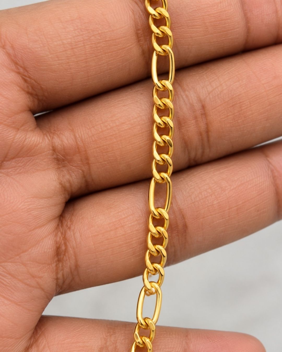 18k Gold Plated Figaro Mens Chain Model Image men wearing in traditional wear ideal for dailywear ,office wear ,partywear