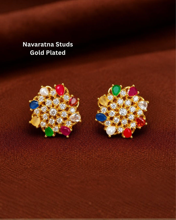 Beautiful gold plated floral earrings featuring a lustrous pearl center, colorful petal-shaped stones, and sparkling crystal accents, perfect for festive occasions, parties, weddings, and traditional looks.