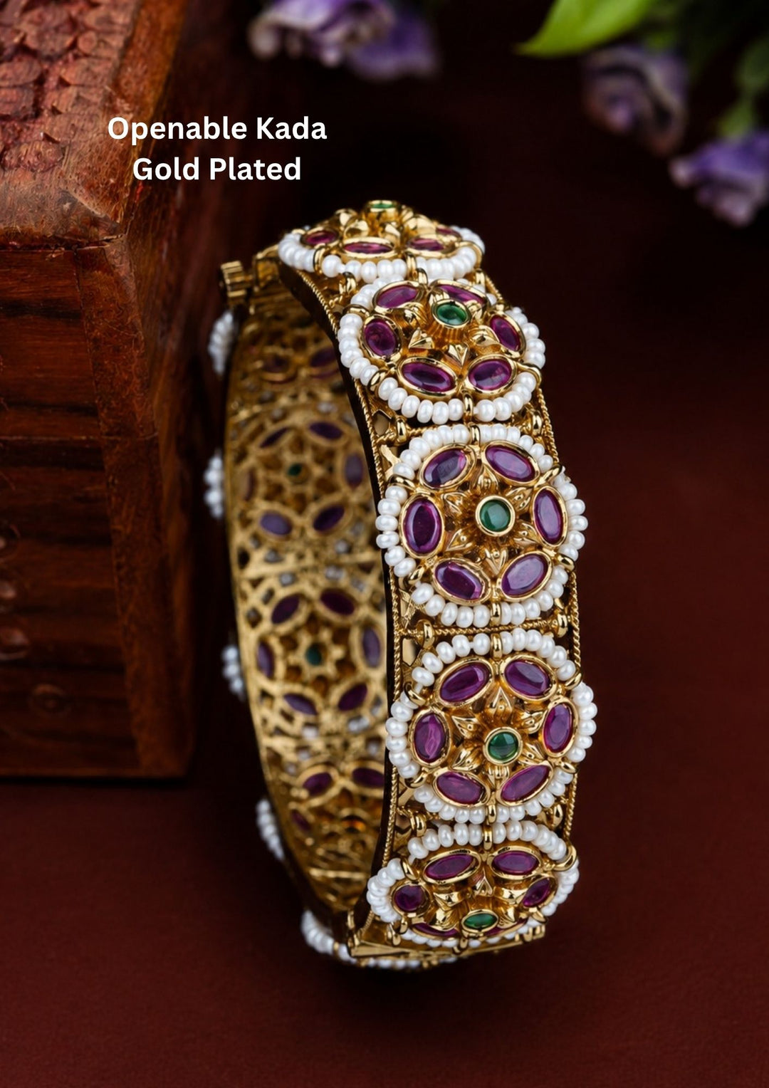 Beautiful Jadau Kundan gold plated openable kada adorned with pearls, ruby and green stone floral motifs, and intricate craftsmanship. Perfect for weddings, festive occasions, traditional wear, and premium gifting.