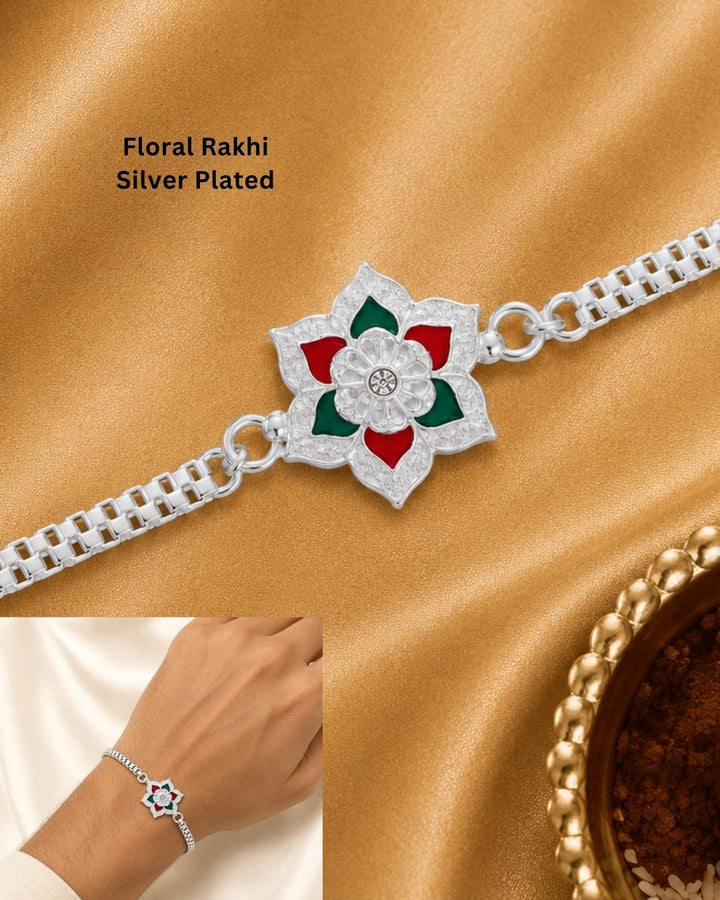 Traditional Silver Plated Floral Rakhi Bracelet with a finely crafted flower design, colorful enamel accents, intricate craftsmanship, and a durable silver-tone chain.