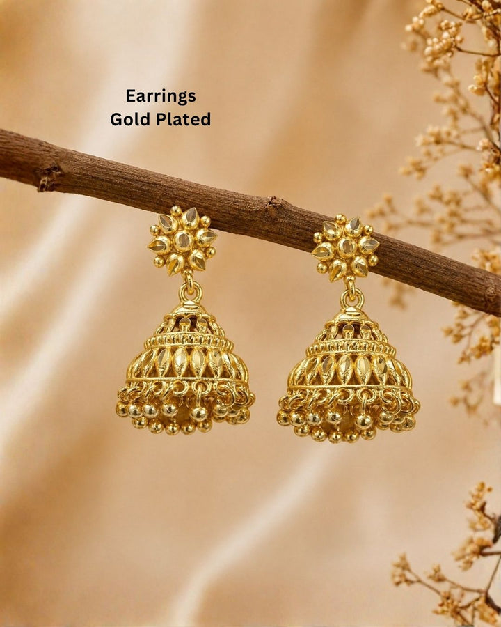 Premium gold plated traditional jhumka earrings featuring intricate floral craftsmanship, detailed dome-shaped designs, and elegant hanging gold bead accents. Perfect for sarees, festive occasions, weddings, classical dance performances, and traditional events.