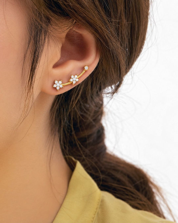 Stylish open gold plated ear cuff decorated with sparkling zircon stones, perfect for modern and festive looks.