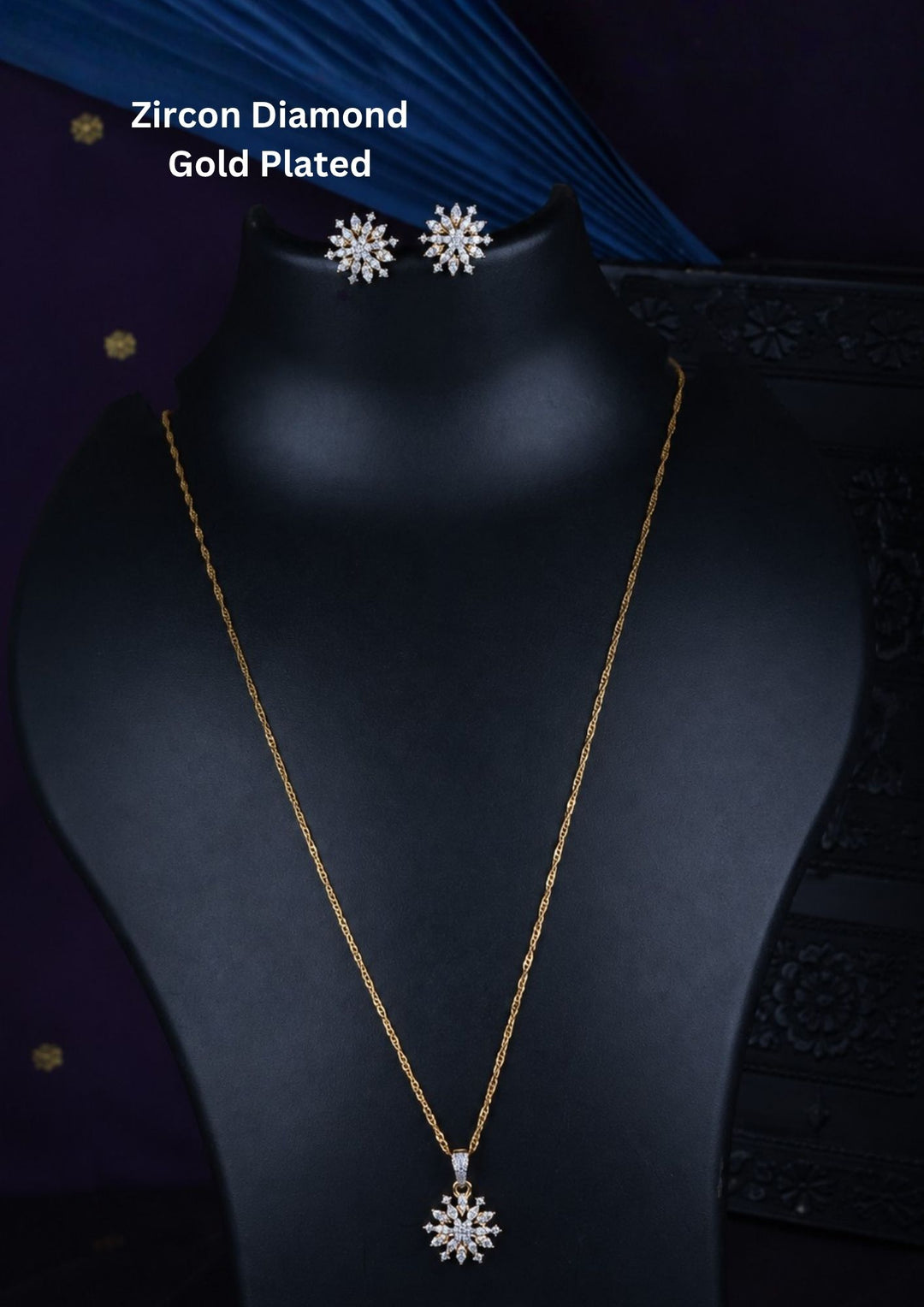Lightweight zircon diamond pendant set with a delicate gold plated chain and matching flower-shaped earrings, perfect for festive and party wear.