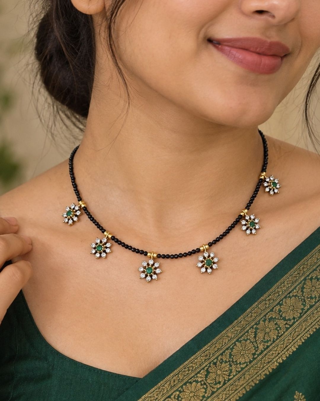Necklace with floral designs