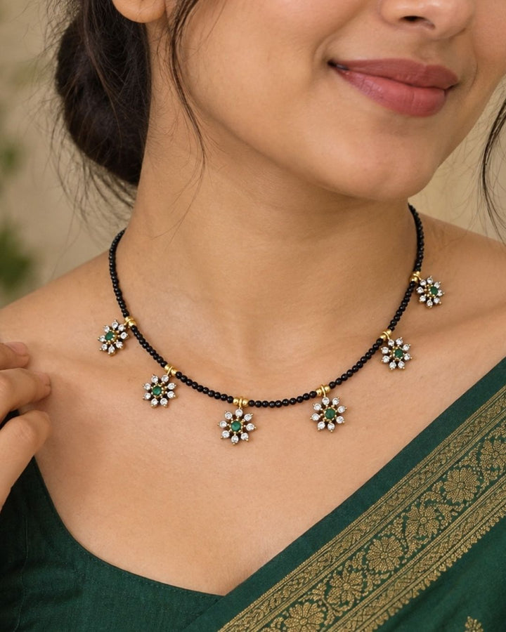 Necklace with floral designs