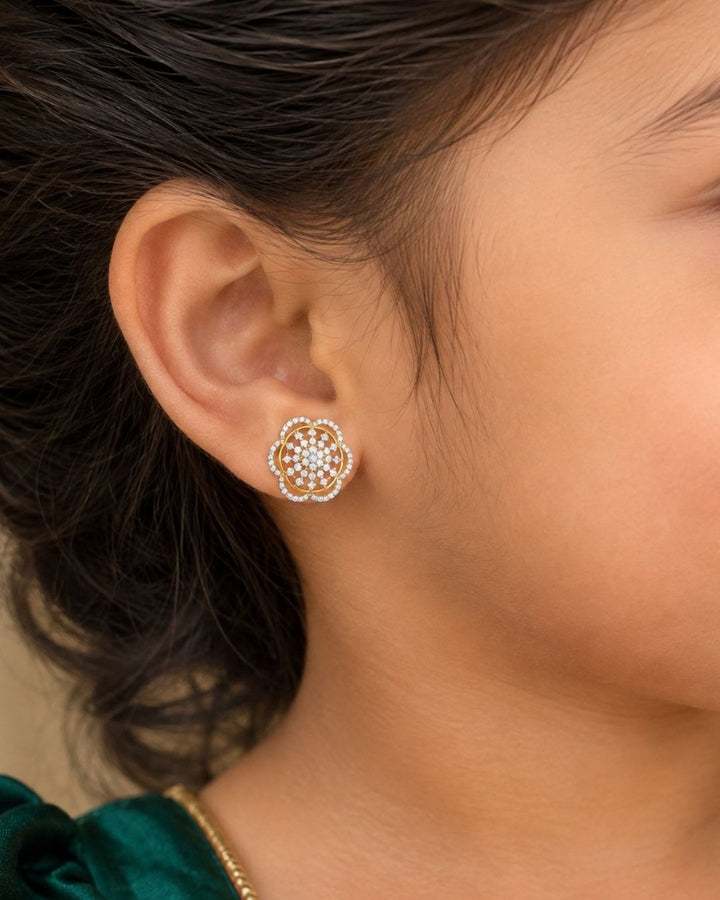 Gold-plated zircon diamond floral stud earrings feature a layered rosette design beautifully paved with brilliant white zircon diamonds over a rich gold-plated base, forming a sparkling, symmetrical blossom. making these versatile studs a perfect standalone accessory for both festive events and elegant cocktail parties.