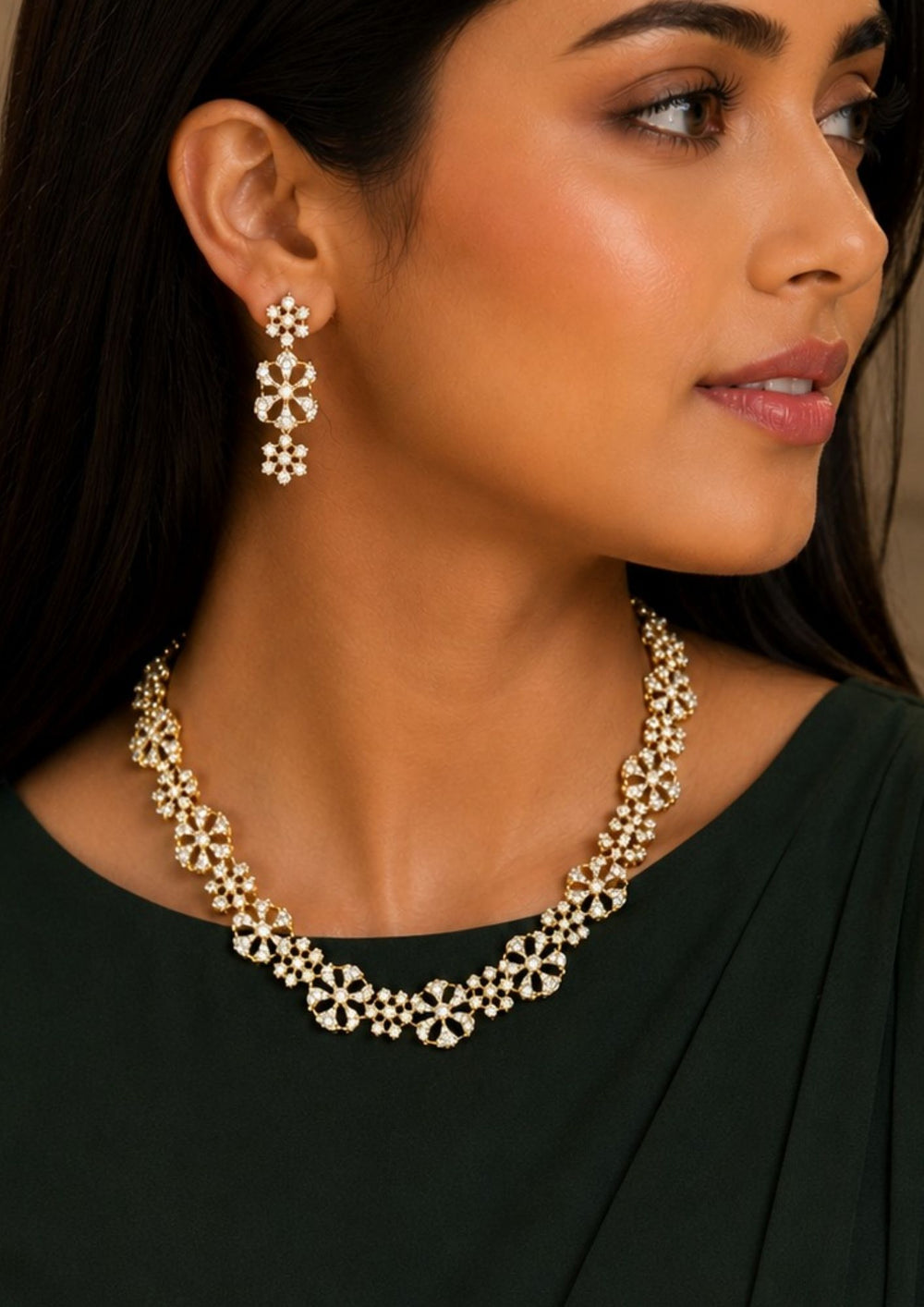 South Indian Woman wearing a Gold-plated zircon diamond necklace and earrings comes with flower design and shows in detailed how it look and looks very classy and neat finishing and can be use for festival , weeding and can gift 