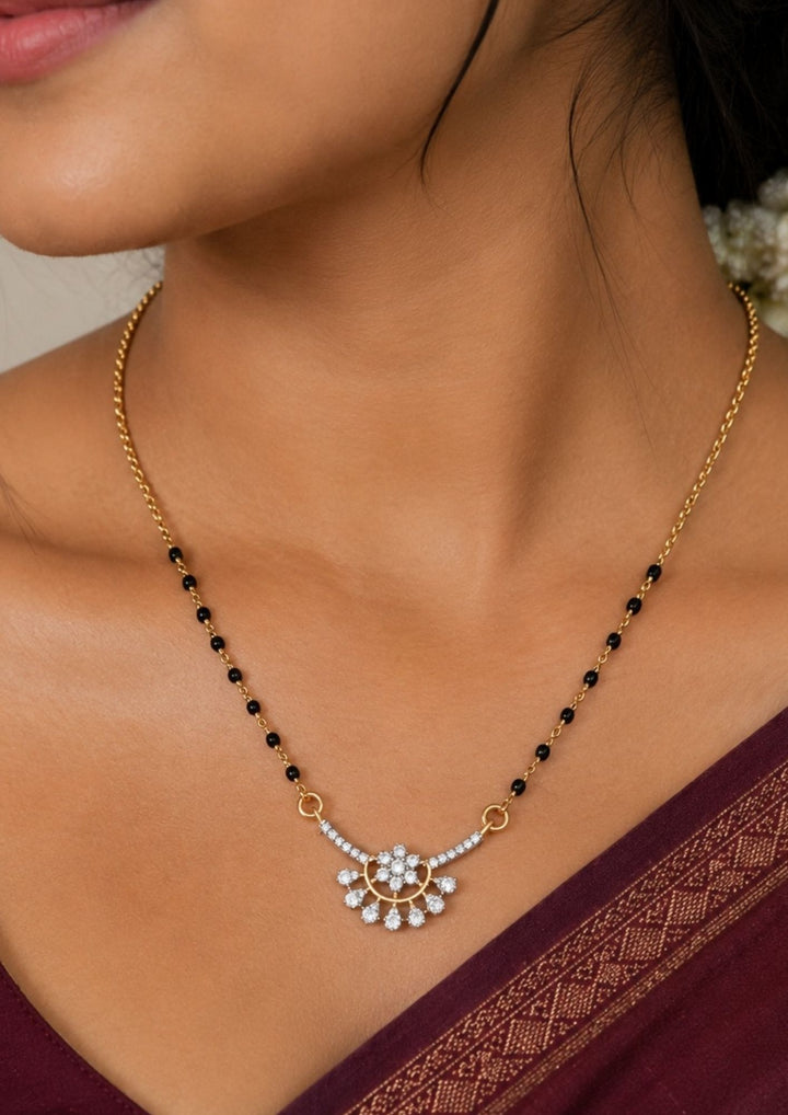 Close-up of a woman wearing a gold plated classic mangalsutra (nallapusallu) come with zircon diamond and its a traditional to all the women and can use for dailyware , festival ware , functional 