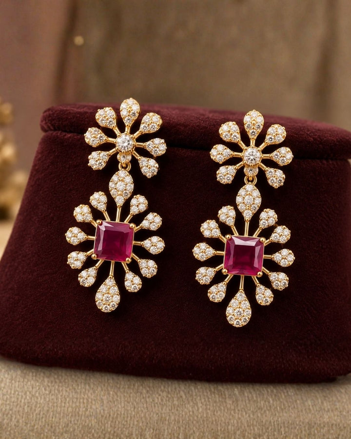 South Indian women wearing a premium zircon diamond gold plated necklace and matching earrings designed with shimmering clear stones and vibrant multi-color jewel accents that give a graceful modern royal look with lightweight comfortable use