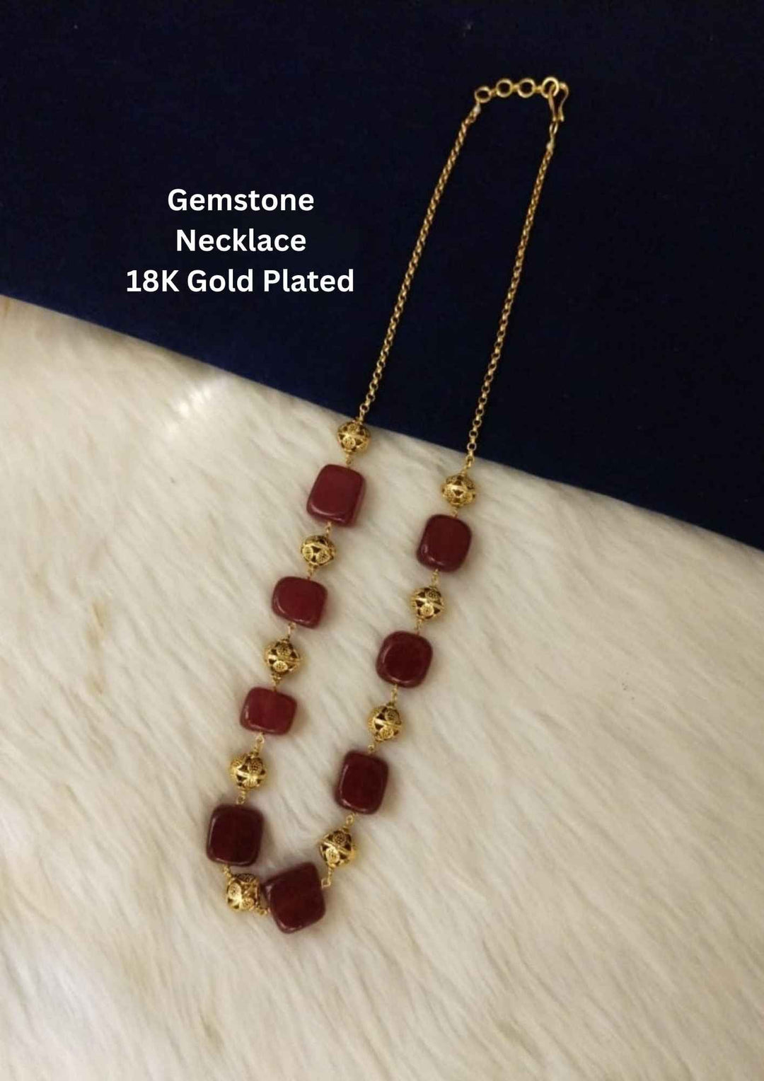 Gemstone necklace with gold accents