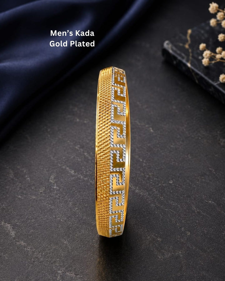 Stylish gold plated statement bangle featuring a textured gold finish and a continuous Greek key geometric design with silver-tone detailing. Perfect for festive occasions, traditional outfits, parties, weddings, and everyday styling.