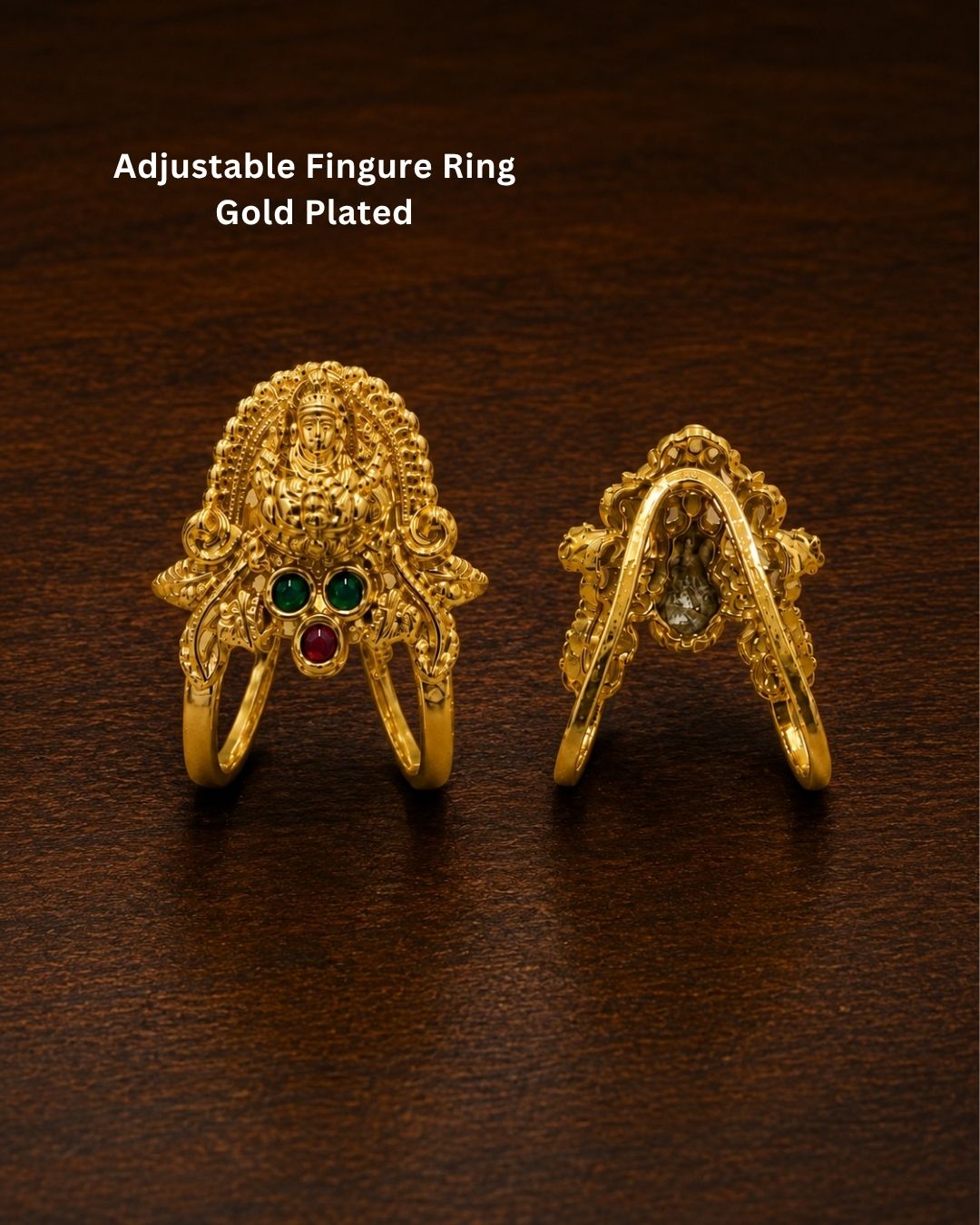 Beautiful Lakshmi Devi gold plated ring featuring an intricate goddess motif, green and ruby-colored stone detailing, and an ornate traditional finish. Perfect for festive occasions, temple visits, traditional outfits, and gifting.