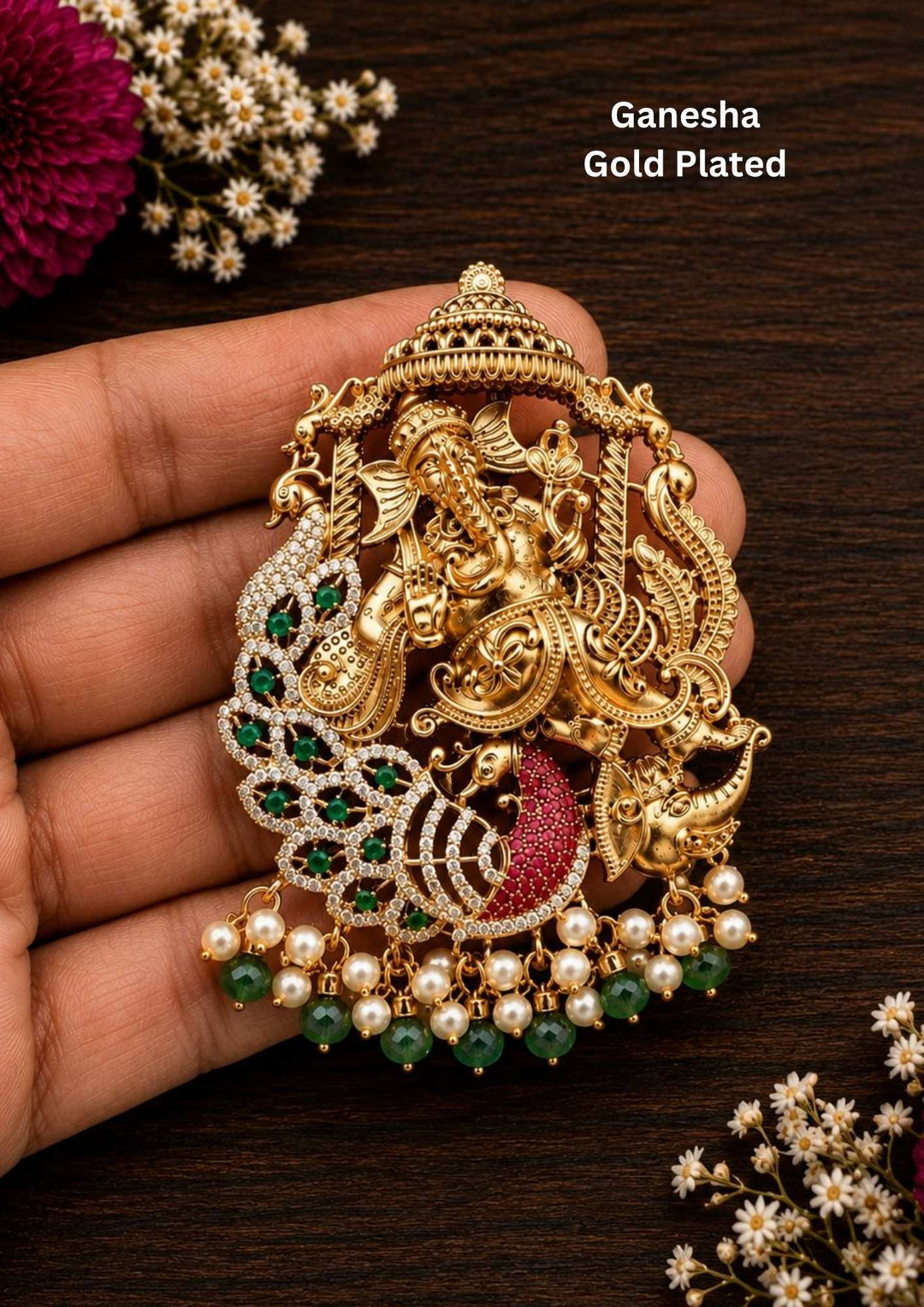 Gold-plated Ganesha pendant with peacock design and with guttapusalu that held grenen and white perls its perfect for bridal wear , weddings it is anti fade color