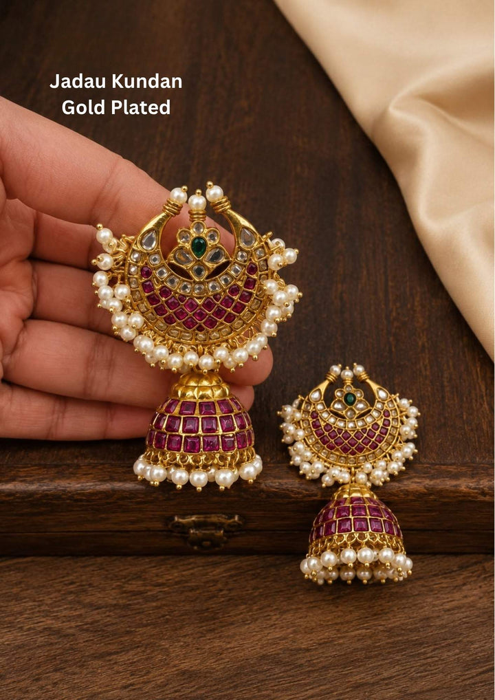 Gold-plated Jadau Kundan earrings with real kempu and come with guttapusallu and with moon shape earrings and it will not fade a colour and can be used for festivals and weeding's   