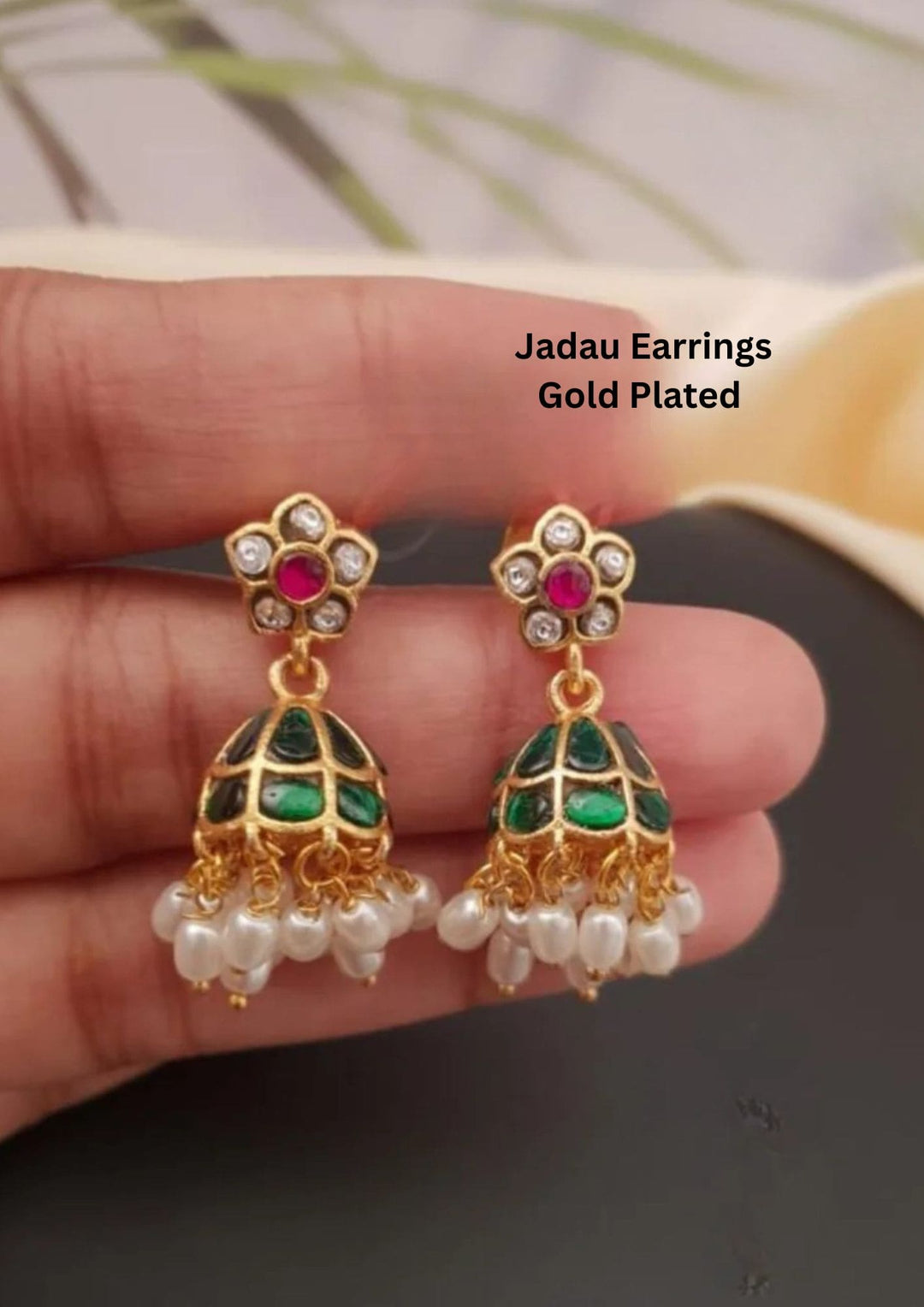 Gold-plated Jadau earrings with green and red stones