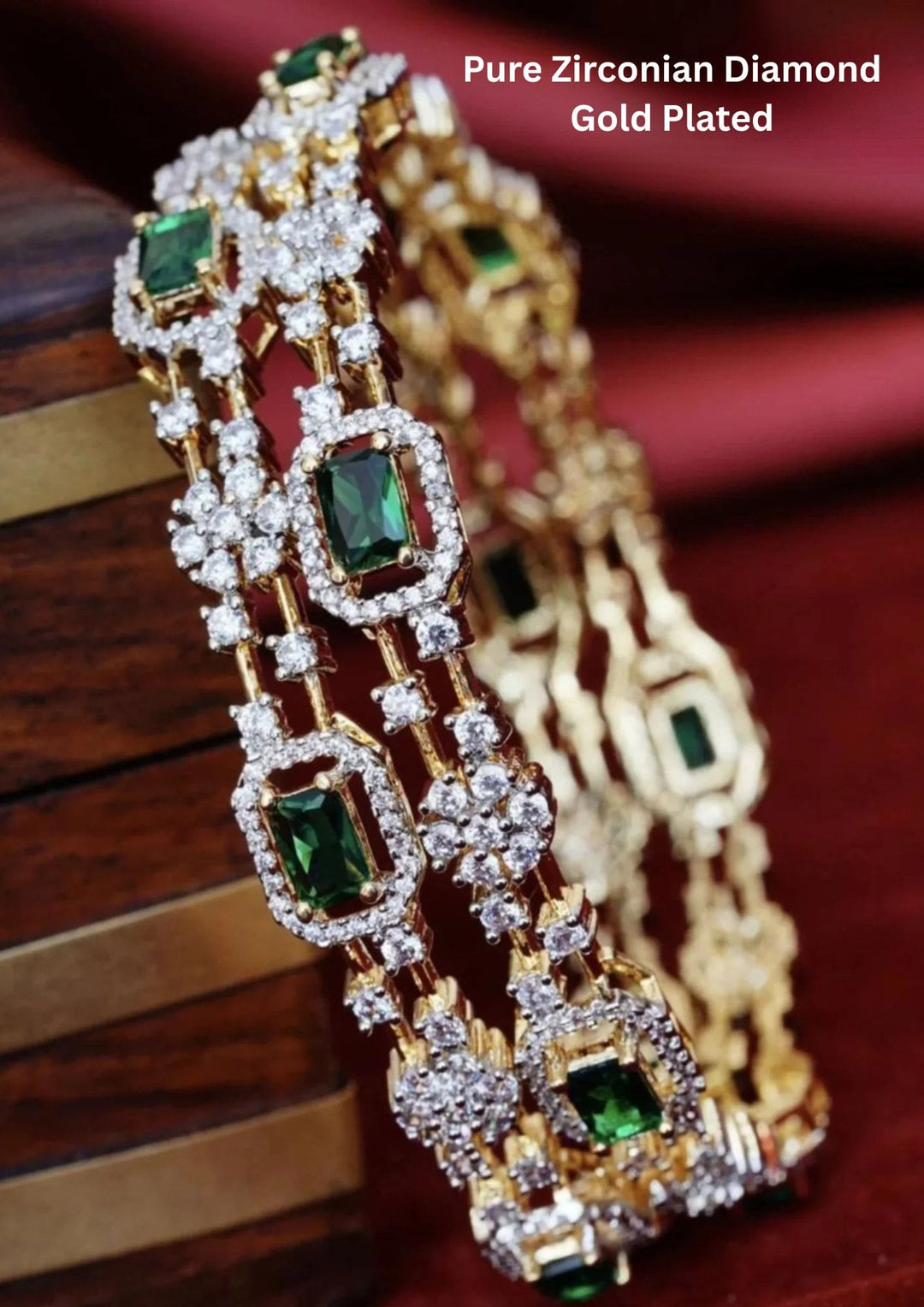 Gold-plated bangles with green gemstones 