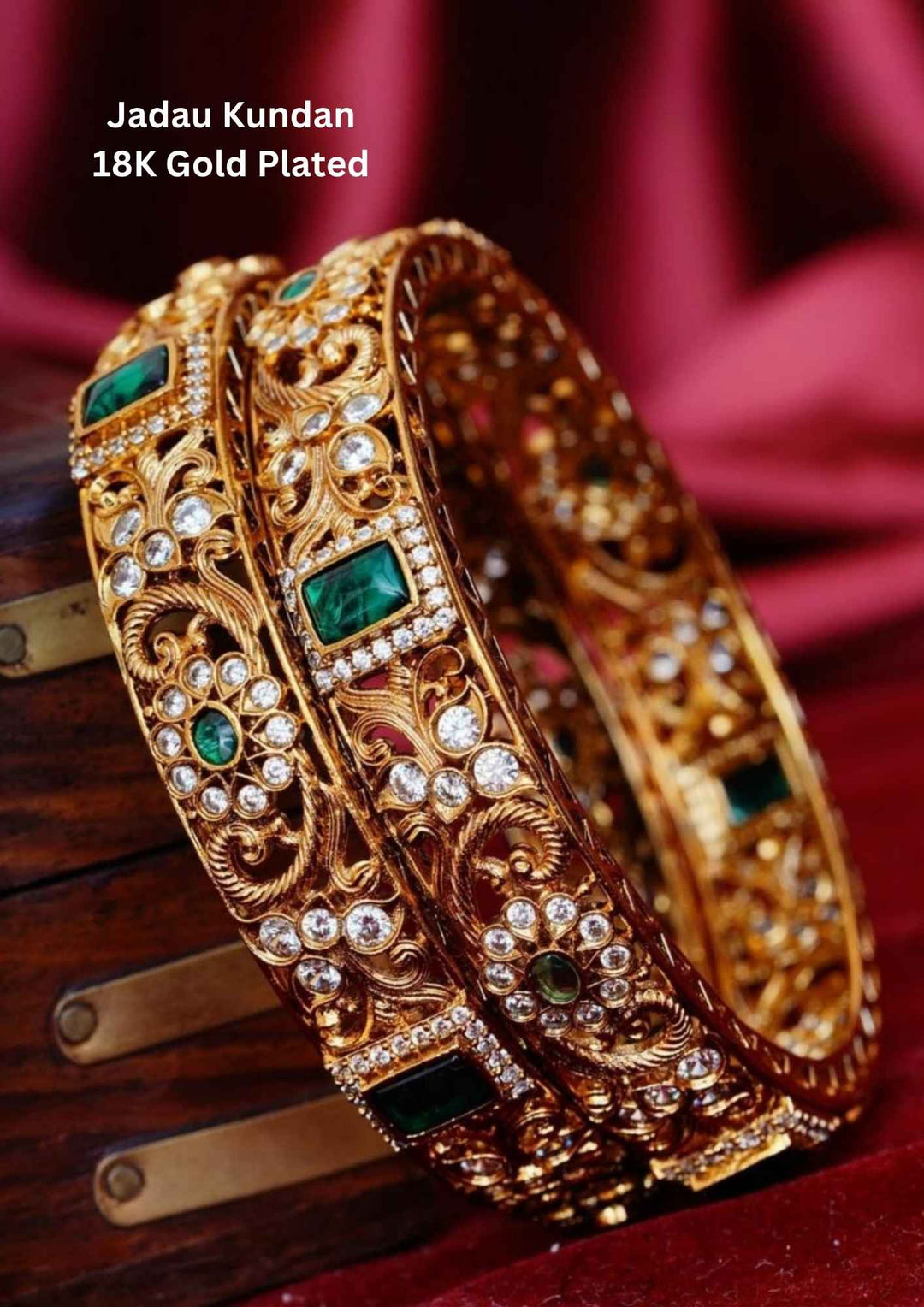 Gold-plated bangles with green stones