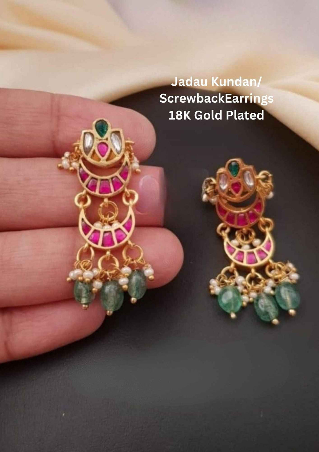 Gold-plated earrings with green and red stones