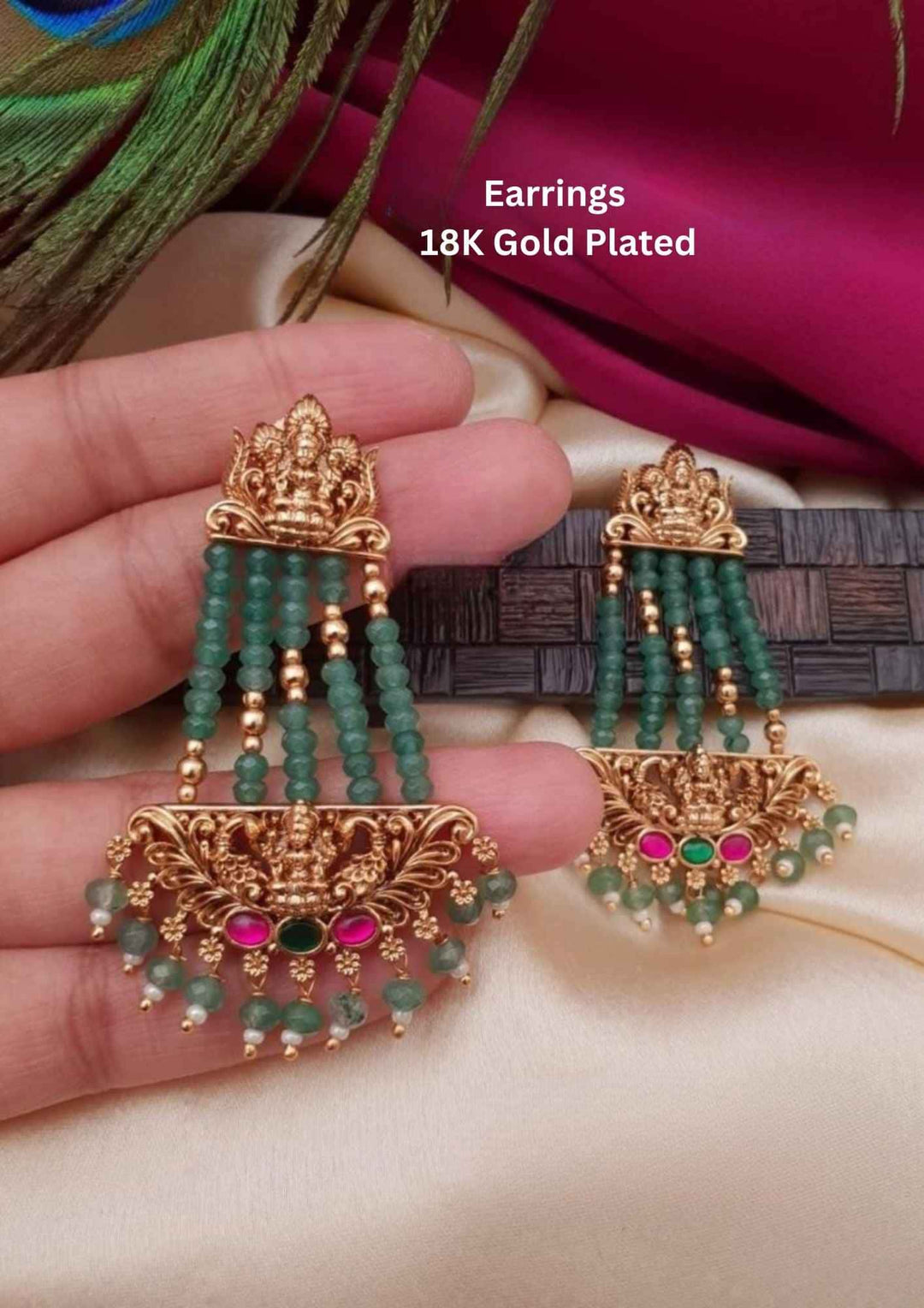 Gold-plated earrings with green beads