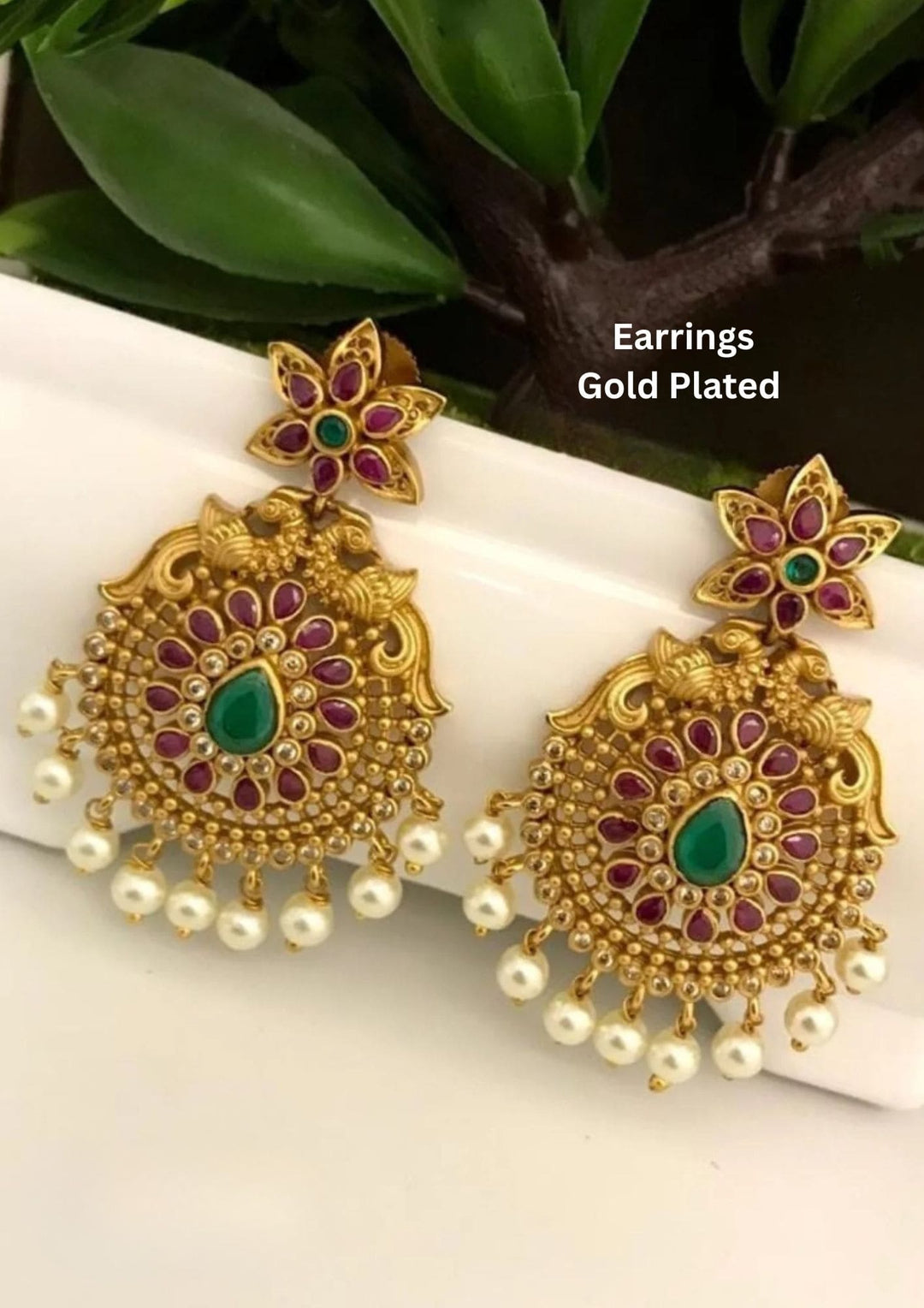 Gold-plated earrings with green and red stones