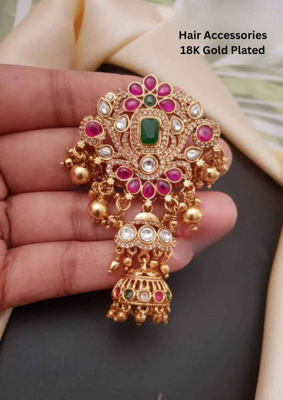 Gold-plated hair accessory with gemstones