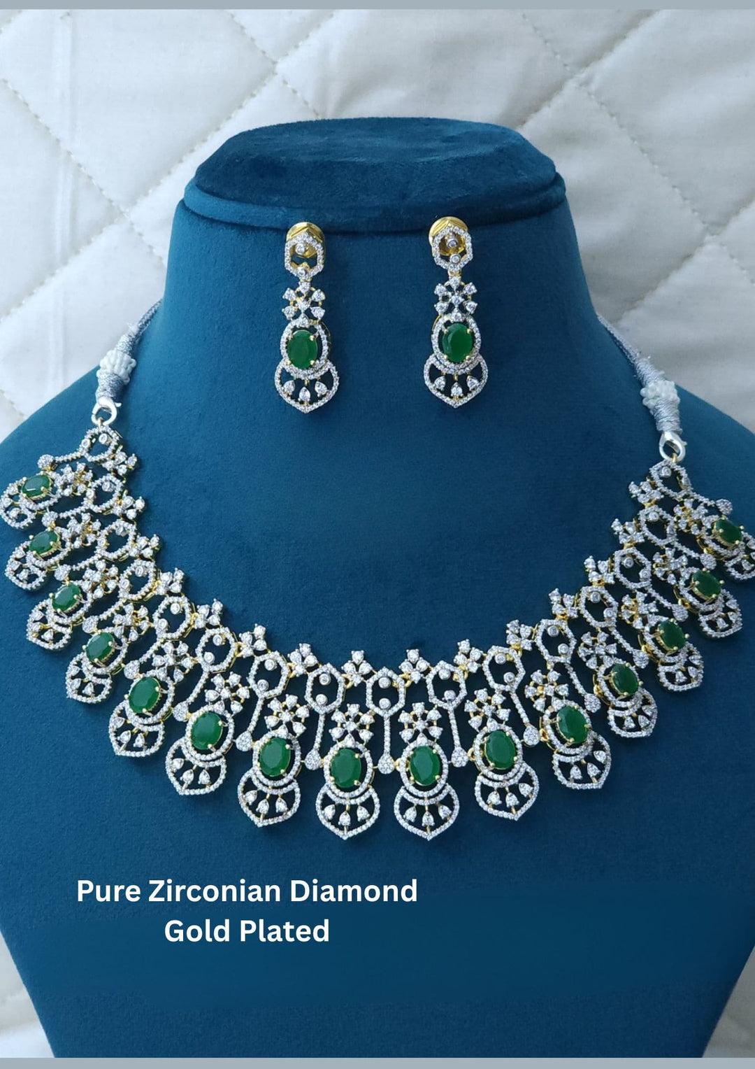 Gold-plated necklace and earrings with green stones 