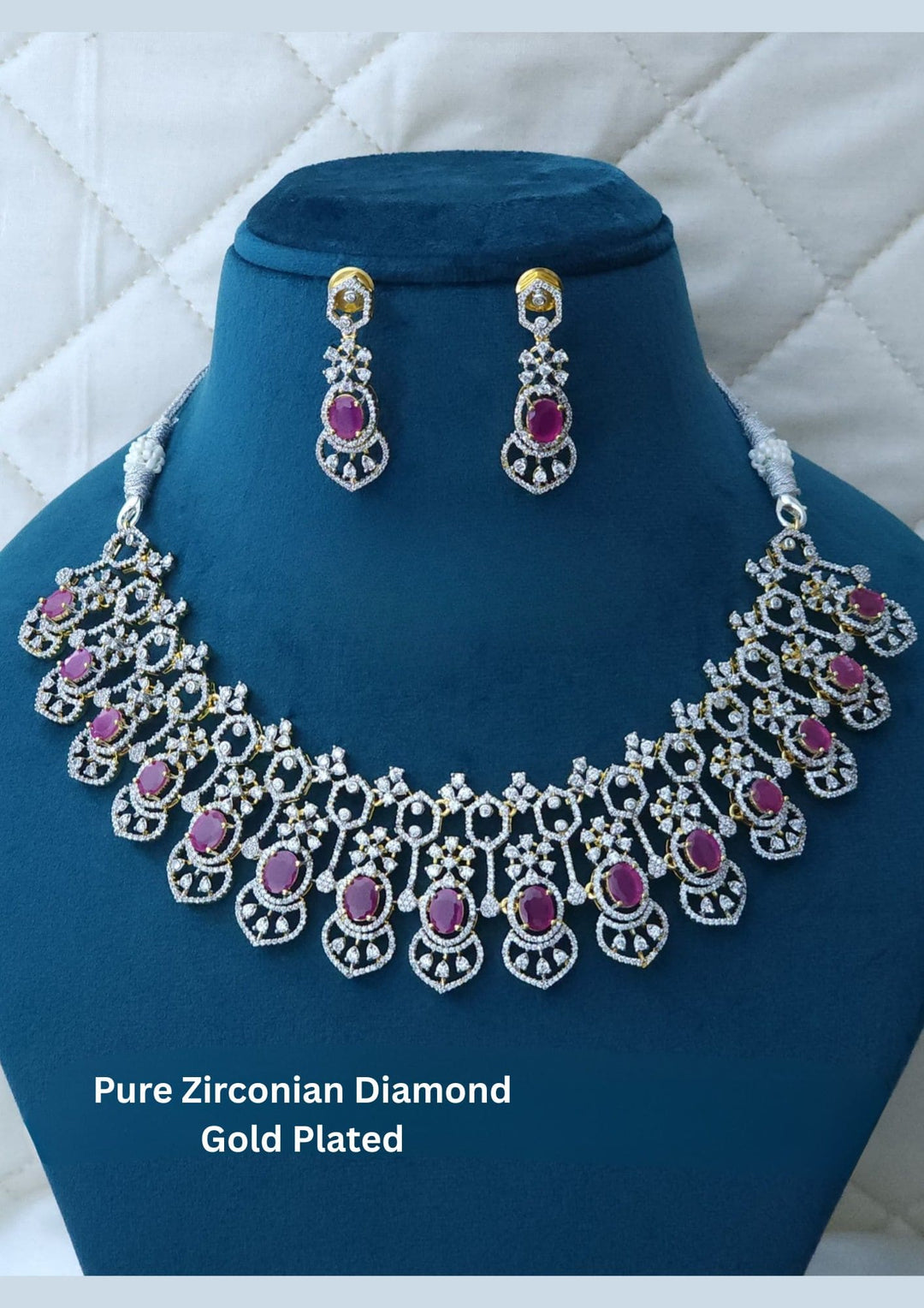 Gold-plated necklace and earrings with zirconia stones