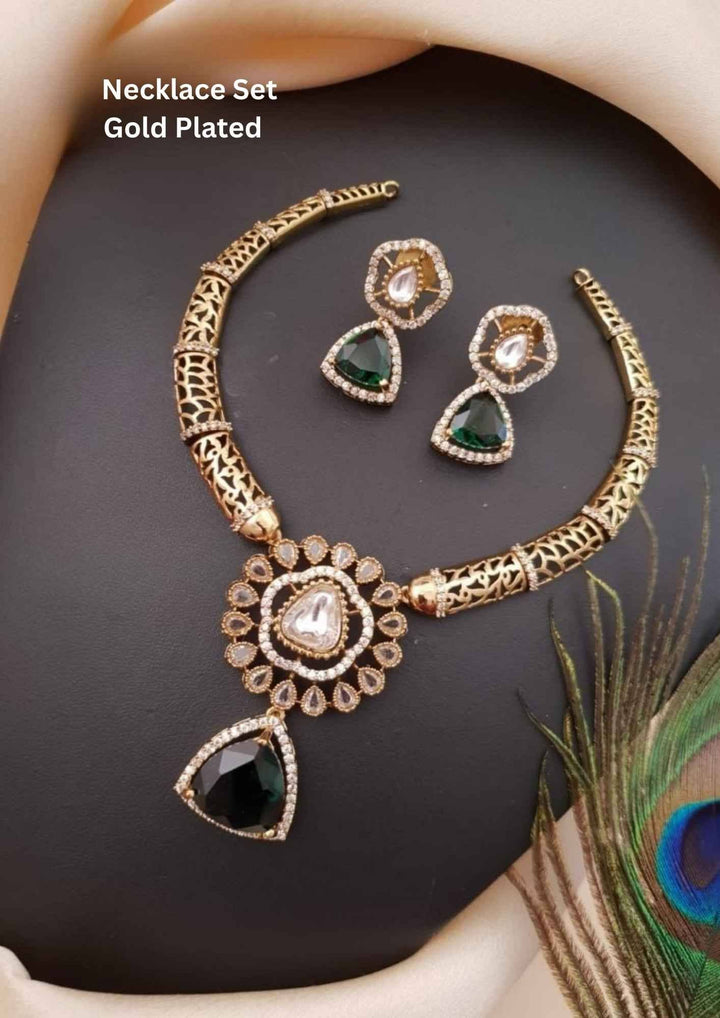 Gold-plated necklace set with green gemstones