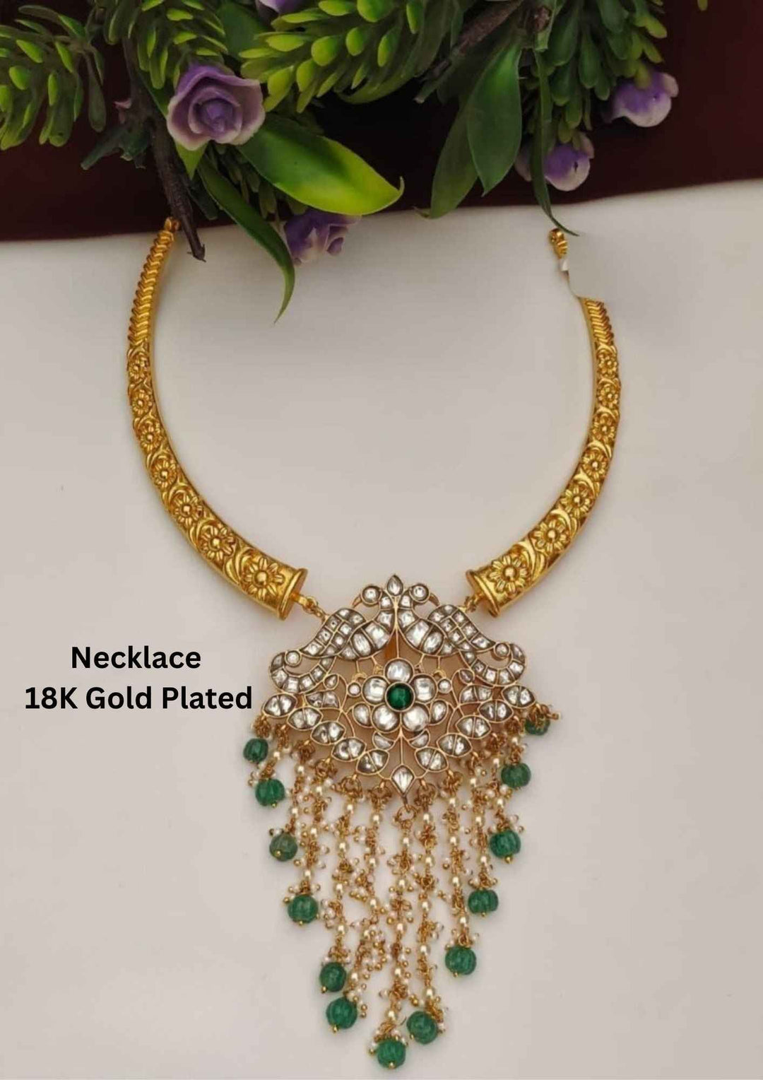 Gold-plated necklace with green stones