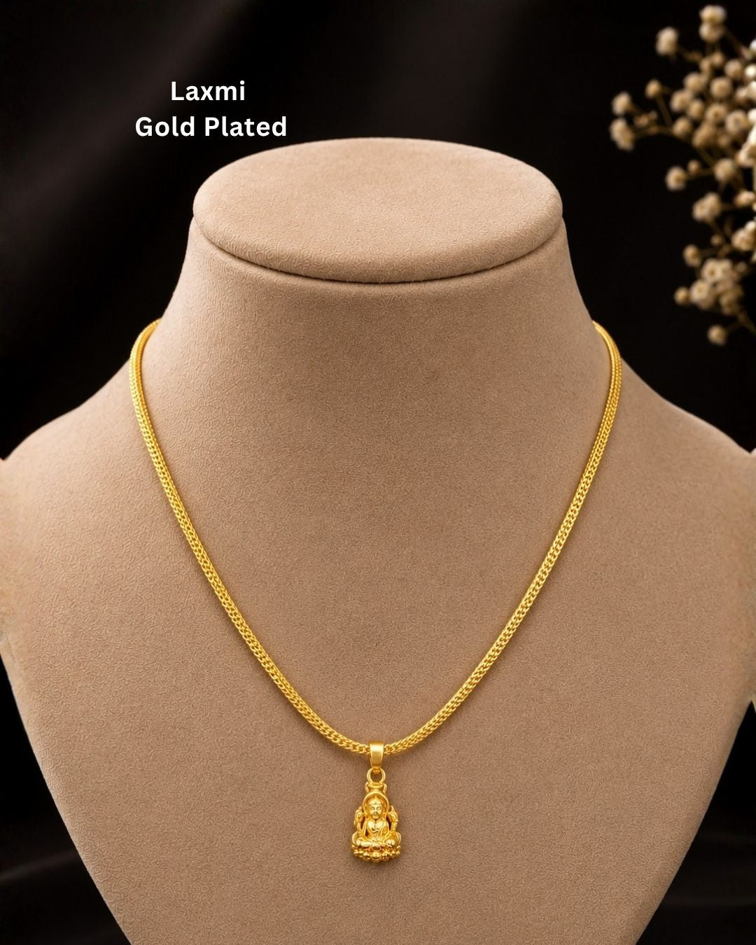 Beautiful gold plated necklace featuring a delicate textured chain and a traditional Lakshmi goddess pendant with intricate detailing. Perfect for traditional wear, festive occasions, weddings, daily wear, and gifting.