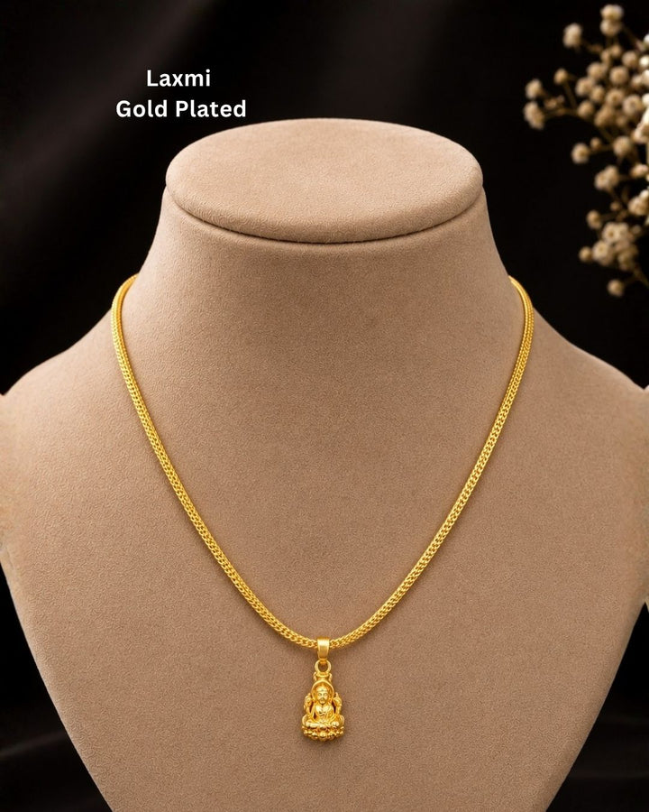 Beautiful gold plated necklace featuring a delicate textured chain and a traditional Lakshmi goddess pendant with intricate detailing. Perfect for traditional wear, festive occasions, weddings, daily wear, and gifting.