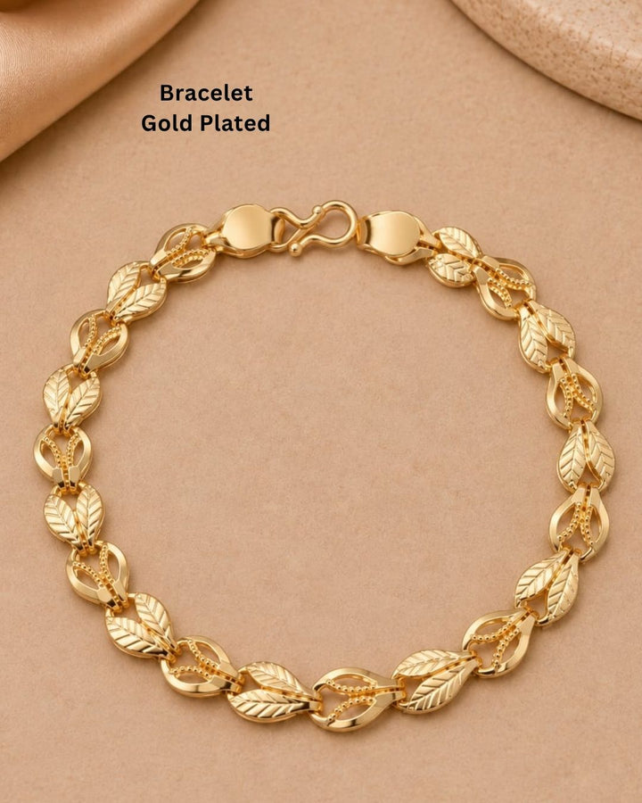 Beautiful gold plated bracelet featuring repeating leaf-shaped links with detailed vein patterns and polished connecting elements. Perfect for traditional wear, festive occasions, daily wear, and gifting.
