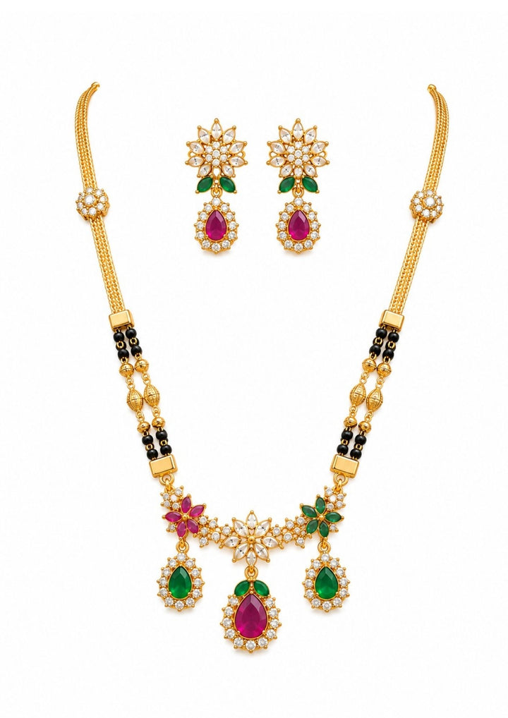 Gold necklace with gemstones and matching earrings on a white background old plated multi colour mangalsutra (nallapusallu) come with zircon diamond and its a traditional to all the women and can use for dailyware , festival ware , functional 