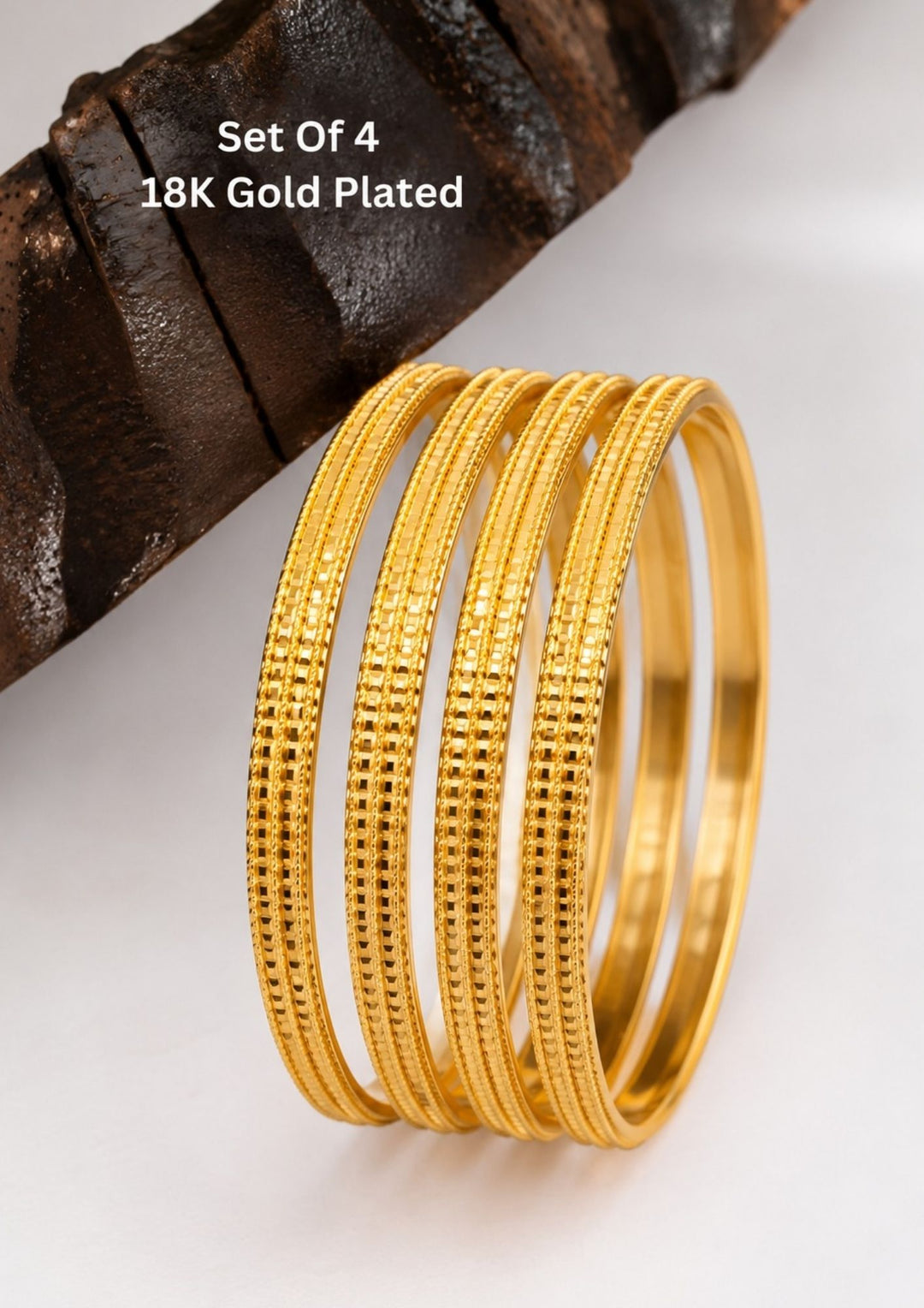 Premium set of four 18K gold plated bangles featuring beautifully engraved geometric patterns.
Designed for lightweight comfort and long-lasting shine.
Perfect for festive celebrations, weddings, office wear, and gifting.