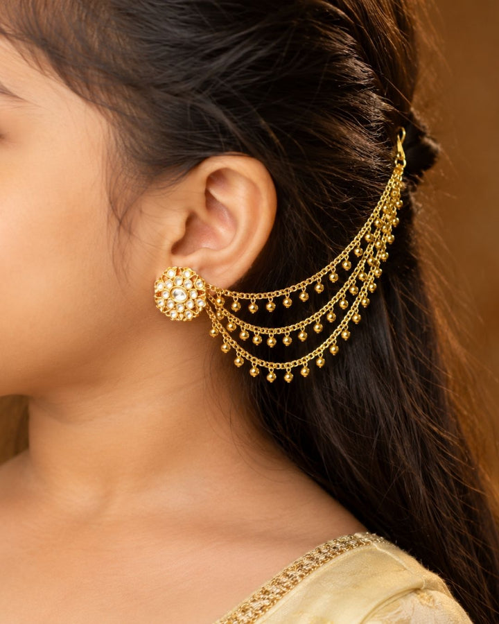 Elegant gold plated multi-layer waist chain featuring delicate dangling beads, designed to complement sarees, lehengas, and bridal attire.