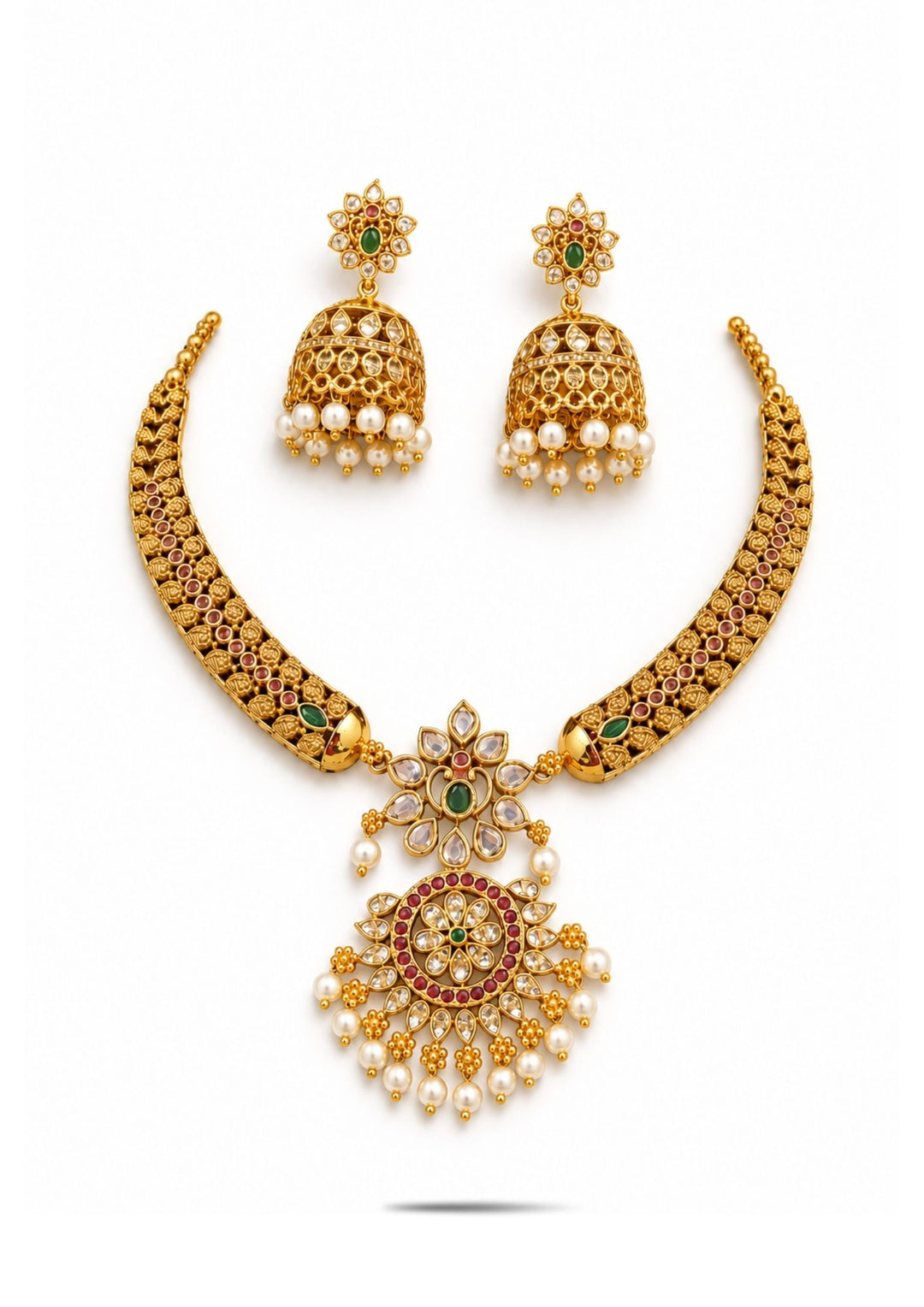 Gold necklace Set with a detailed pendant and earrings  on a white background with green and red stones come with jadau kundan in necklace set with beads and in pendent shows clear design and in detailed shown in picture it will not fade color and water proof can used for festivals, bridals, and weeding's  