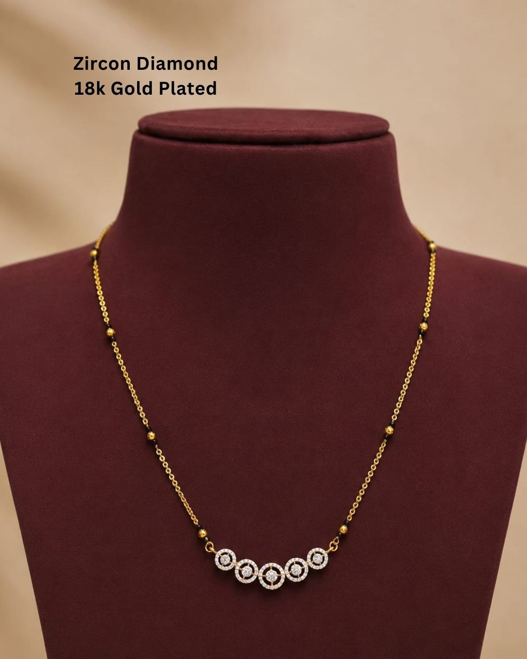 Traditional gold plated mangalsutra necklace with black beads and five shimmering CZ circle accents, ideal for daily and festive wear.