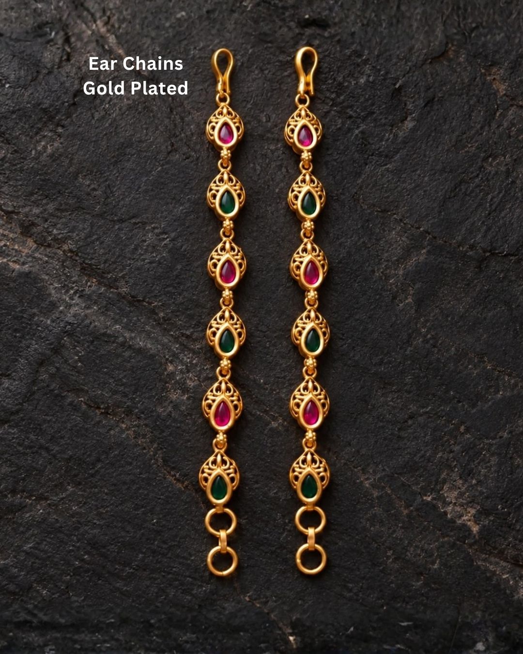 Gold plated traditional ear chains featuring alternating red and green teardrop stones with intricate antique gold detailing.