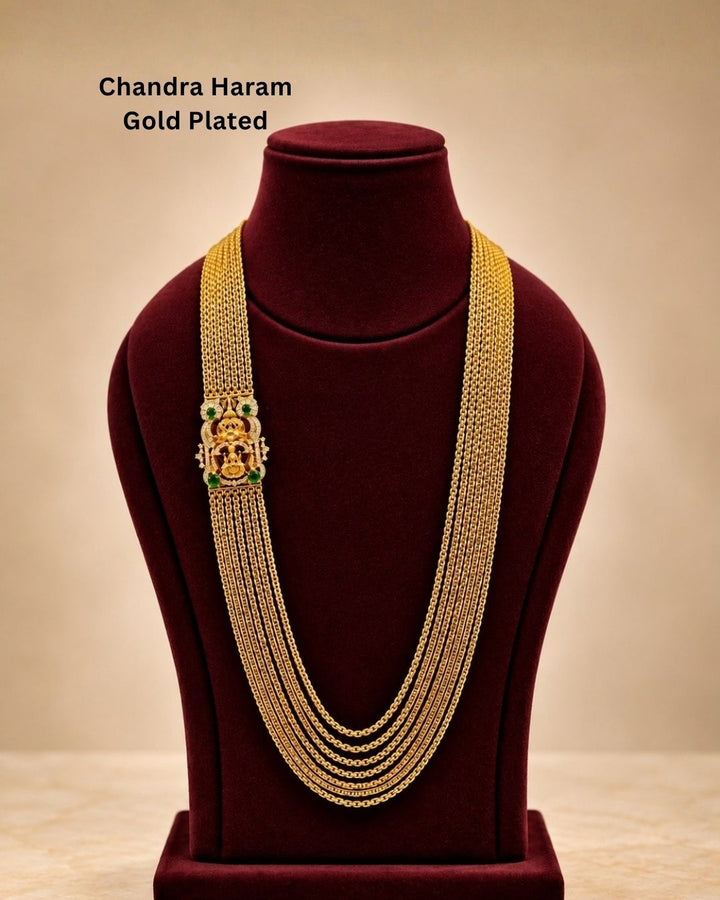 Premium temple style gold plated Lakshmi Chandraharam designed with multiple layered chains, traditional craftsmanship, and a detailed Lakshmi motif for ethnic and bridal jewellery collections.