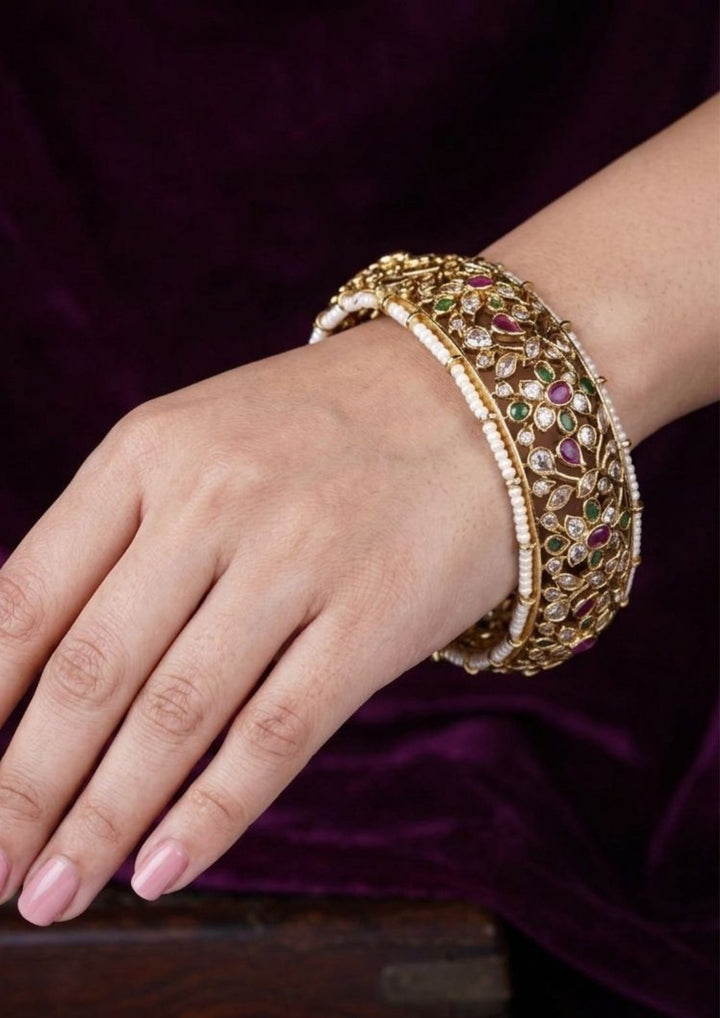 gold plated openable kada showing in picture how it look for south Indian women hand and can see Clearly how classic look it gives  and can be used for weeding's , festivals and can gift 